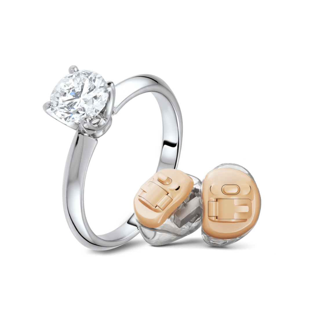 מכשיר שמיעה קטן ועוצמתי IIC HANSATON עם טבעת יהלום להשוואה של הגודל